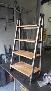Although called kitchen shelves, they are a perfect match with the garment rack and can be used for clothing (or whatever!). Metal And Wood Shelf It Ended Up In The Kitchen With Books And Some Vegetables Boxes Decoracao De Estante Prateleiras Para Garagem Moveis Estilo Industrial