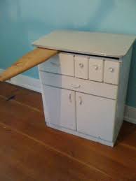 In the style most common in homes during the era of the beach boys, these durable, steel framed tables are perfect for a simple, thoughtful kitchen. Artifact Vintage Metal Cabinet With Formica Top Vintage Metal Cabinet Metal Cabinet Metal Kitchen Cabinets