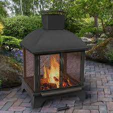 The most common chimney fire pit material is metal. Outdoor Fireplaces Outdoor Heating Outdoor Fireplace With Chimney Fire Pits Outdoor Fireplaces Sturdy High And Easy Access Door With This 45 In Outdoor Fireplaces Theamalfiexperience Com