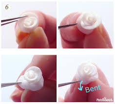 Rhinestones and their designs are just work of art. Acrylic Nail Art Nailbees