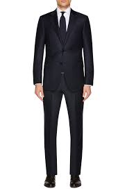 Here is a quality suit similar to what is being worn in the video: The Perfect Suit For Every Type Of Guy