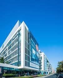 K&h bank operates as a universal bank, providing retail, private, business, corporate and investment banking products and services to individuals, smes and large corporations. K H Bank Headquarters Trigranit Trigranit