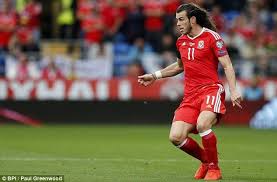 Gareth Bale Shows Off His Lengthy Locks During Wales 1 1 Georgia Gareth Bale Welsh Football Down Hairstyles