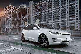 Abs brakes, alloy wheels, compass, electronic stability control, front bucket seats, front center armrest, front dual black tesla model x. Futuristic Looks Of White Tesla Model X On Black Matte Forgiato Wheels Carid Com Gallery