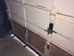 Raise the garage door straight up until the door is absolutely open. Removing Old Style Garage Door Lock Doityourself Com Community Forums