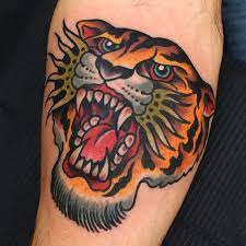 Shaun topper tattoo traditional tattoo traditional tattoo. Traditional Tiger Tiger Head Tattoo Traditional Tiger Tattoo Becoming A Tattoo Artist