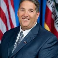 Assemblymember Jim Frazier presents Col. John Klein,