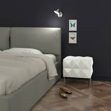 It has high gloss white finish and stainless steel legs. 35 Unique Nightstand Designs That Will Enhance Your Bedroom