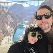 Stopped to pick up a Harley and rode out to the Hoover Dam. Side by side in  two different states. A gorgeous day!