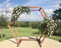 Wood Hexagon Arch With Greenery And Floral Sprays Wood Wedding Arches Wedding Arch Diy Wedding Arch