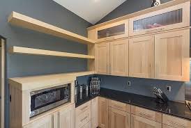 Designer Sarah Cabinets Dura Supreme Cabinetry Napa Panel Plus Door In Natural Maple Custom Floating Shel Custom Floating Shelves Kitchen Design Cabinetry