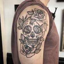 Sugar Skull Tattoo Tattoo Ideas And Inspiration Sugar Skull Tattoos Skull Thigh Tattoos Day Of The Dead Skull Tattoo