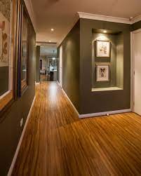 This Hallway Is Full Or Artwork And Recessed Walls With Feature Lights Recessed Lighting Recessed Wall Hallway Lighting