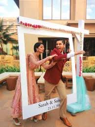 Still Trending Indian Wedding Photo Booth Ideas That Are Fresh Fab For Super Fun Wedding Photos Witty Vows Indian Wedding Photos Booth Wedding Wedding Photo Booth