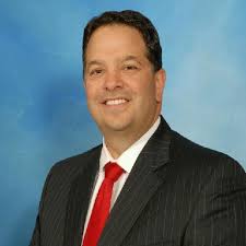 Eric Corrigan email address & phone number