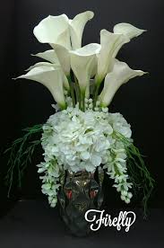 We did not find results for: Tall Floral Arrangement With Calla Lilly And Hydrangea And Wisteria In Whi Hydrangea Flower Arrangements Flower Vase Arrangements Hydrangea Floral Arrangements