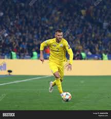 Dutch fan in the stands congratulating and handshaking a ukraine fan after yarmolenko's gol. Kyiv Ukraine Image Photo Free Trial Bigstock