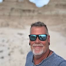 Vanlife Pride does the best potluck! Everyone makes a little place card  with their ingredients. Lots of vegans out here! The line was so long, it  took me exactly one minute to