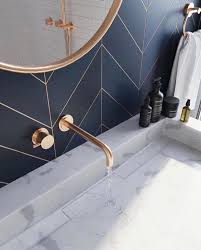 By changing the style in the upper third of a wall, you can exaggerate height in the room. The Modern Nature Inspired Decor Of Hotel Victor Hugo In Paris Bathroom Interior Design Bathroom Inspiration Bathroom Decor