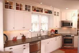 14 Creative Ideas For Pantry And Kitchen Storage Above Kitchen Cabinets Kitchen Soffit Galley Style Kitchen