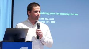 Adam Janovský · Kleptography 101 · SlidesLive