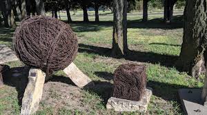 Barbed wire (also called barb wire) is a kind of wire that is used to make cheap fences. For All We Know This Is The Largest Ball Of Barbed Wire And Largest Cube Of Barbed Wire The World Has Ever Seen On Display Outside Of The Kansas Barbed Wire Museum