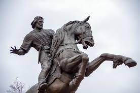 Man making statue, goddess sitting on horse, kumortuli potter. Selective Focus Photography Of Man Riding Horse Statue Photo Free Ryazan Image On Unsplash