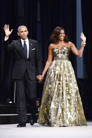 Michelle obama greeted them wearing a red dress with a black belt and shoes. Michelle Obama S 45 Best Formal Dresses And Gowns