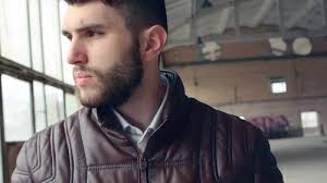 Beau cavalier dans une veste de motard noire, Vidéothèque Y compris : homme  et ancien