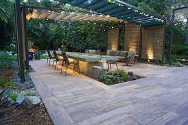 At the first sight, the base of this patio looks like the flagstone which blends well with the green grass around. 75 Beautiful Modern Stone Patio Pictures Ideas July 2021 Houzz