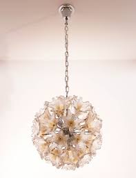 This stunning piece has such a light, delicate pink color and brings such a warmth to any space. Murano Glass Flower Chandelier By Veart 157787
