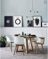 Kitchen Nook This Round Wood Table With The Cool Legs And Those Round White Bucket Style Ch Dining Room Inspiration Dining Room Wall Decor Dining Room Walls