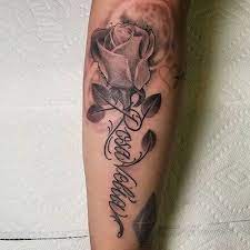 101 Best Rose Tattoo Ideas For Women 2020 Guide Rose Tattoo With Name Rose Stem Tattoo Tattoos With Names