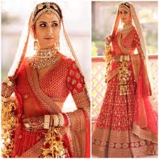 Katrina Kaif makes for a GLORIOUS bride in a red Sabyasachi lehenga with  luminescent glam makeup | PINKVILLA