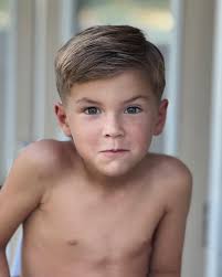 Afternoon haircuts in the backyard making this dude age in fast forward.  Times flyin.