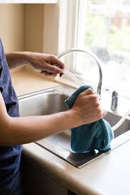 How clean kitchen sink aerator sprayer boom. How To Clean Your Kitchen Sink Sprayer Kitchn