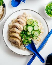 Super Simple And Satisfying Hainanese Chicken Rice Juicy Steamed Chicken And Ginger Garlic Rice Chicken And Rice Dishes Chicken Rice Recipes Hainanese Chicken