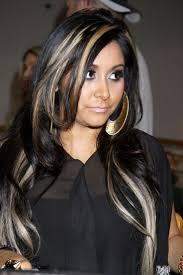 It has subtle layers, so it's easy to style with a piecey effect. Dark Hair With Blonde Highlights Hairstyle Guides