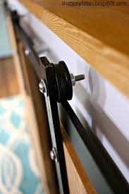 This sliding door track can be made for under $100 including wooden wheels & track.the ebook available in the blog post, provides a full list of the tools and supplies you'll need; Diy Sliding Barn Door Console Hardware Tutorial Jaime Costiglio