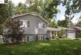 Modern home designs tend to focus on lighting details. Split Level Renovation Remodel Curb Appeal Front Porch Paint Colors Garage Sidin 2019 Spli Split Level Remodel Exterior Exterior House Remodel House Exterior