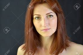 Attractive woman with red hair in witches costume. White Girl With Red Hair And Green Eyes With Eyelash Extensions Stock Photo Picture And Royalty Free Image Image 125893500
