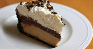 It's the most decadent and indulgent peanut butter pie ever, made with extra peanut butter in the filling, peanut butter cups on top, and a drizzle of melted peanut butter and chocolate. Pin On Dessert