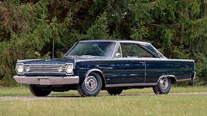 Black interior with console and bucket seats.hurst shifter. 1966 Plymouth Hemi Satellite S183 Kissimmee 2020