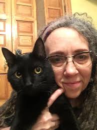 Captioning a photo of a cat and a dog