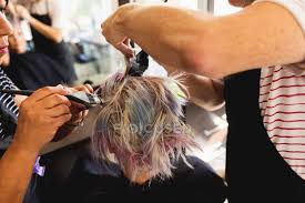 Haircut and hair salon services for all hair types, textures, and needs. Rear View Close Up Of A Middle Aged Caucasian Male Hairdresser A Middle Aged Mixed Race