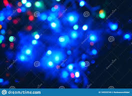 Christmas Colorful New Year S Bokeh Neon Lights Abstract Blurred Photo Background With Blinking Lights From Tangled Garlands Decoration With Bright Colored Ne