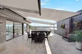Motorised Rainproof Retracting Awnings Provide Rain And Sun Protection For This Exposed Large Terrace Pergola Pergola Designs Rustic Pergola