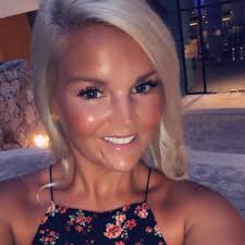 Can a team pass out candy downtown in Arkansas City Kansas?