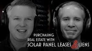PURCHASING REAL ESTATE WITH SOLAR PANEL LEASES & LIENS