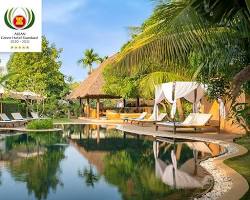 A tranquil pool surrounded by greenery at Navutu Dreams Resort.